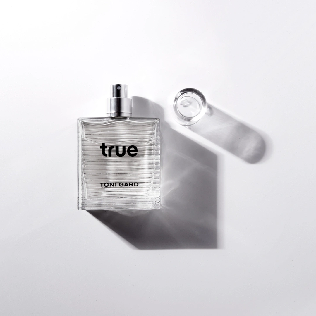 Perfume bottle with the word 'true' and the name 'TONI GARD' on a white background.