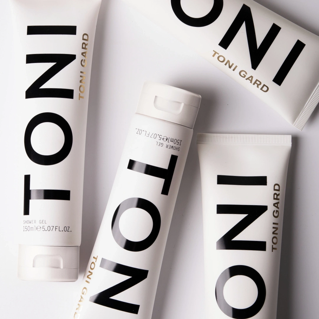 Close-up of Toni Gard shower gel tubes on a white background.