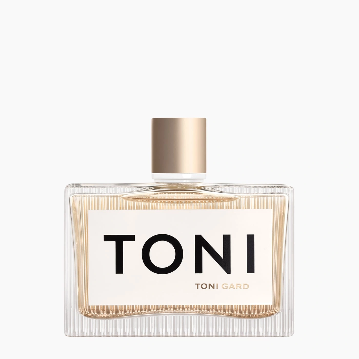 Toni Gard perfume bottle, rectangular, golden cap, white label with black text